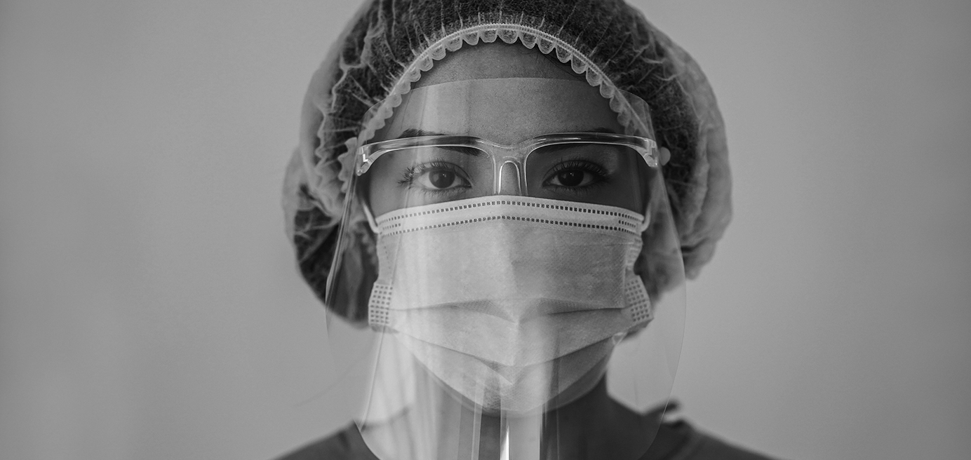 black and white image of a nurse in ppe