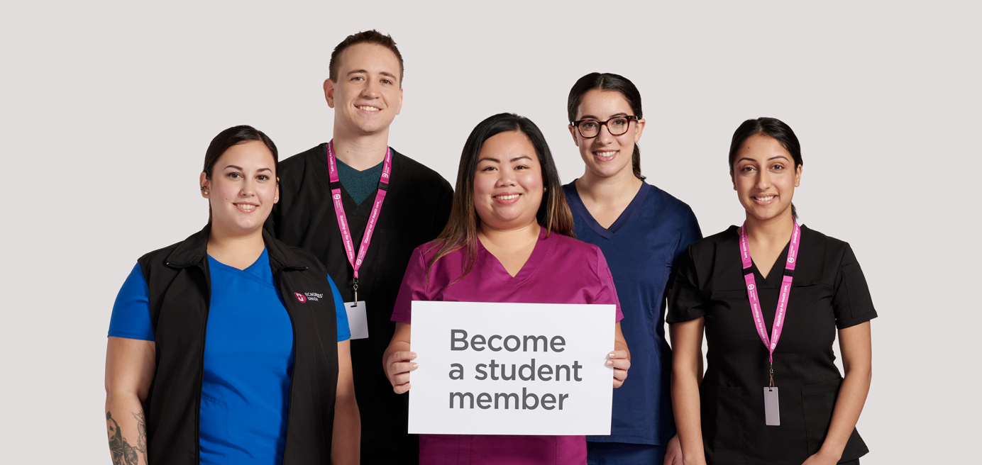 Group of young nurses holding sign 'Become a Student Nurse'