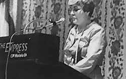 Member speaking at the podium