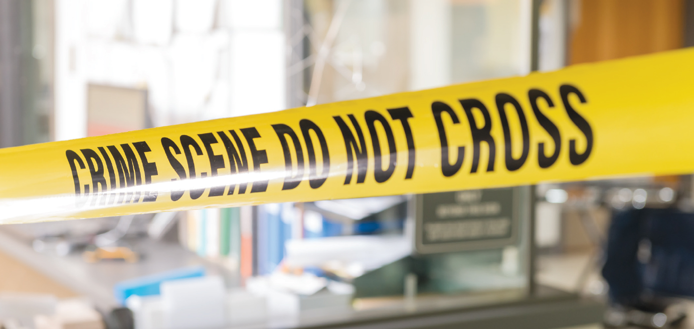 'Crime scene do not cross' taped across disheveled room