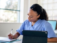 The BCNU logo is shown with the text New Bursaries and Scholarship Fund, and an image of a nurse sitting at a desk while writing in a notebook. 