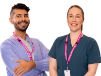 Picture of two members standing side by side