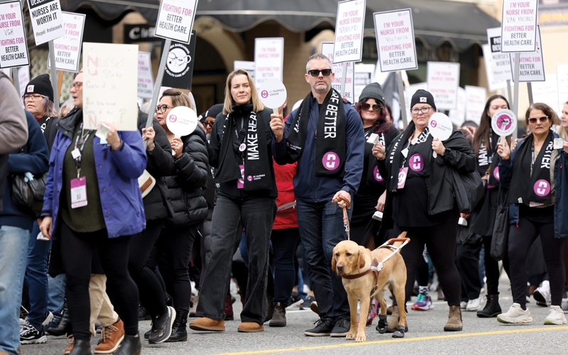 Members march in downtown Vancouver on day two of the conference. 