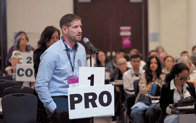BCNU Simon Fraser region member Frank Martens poses a question to members of the Provincial Executive Committee.