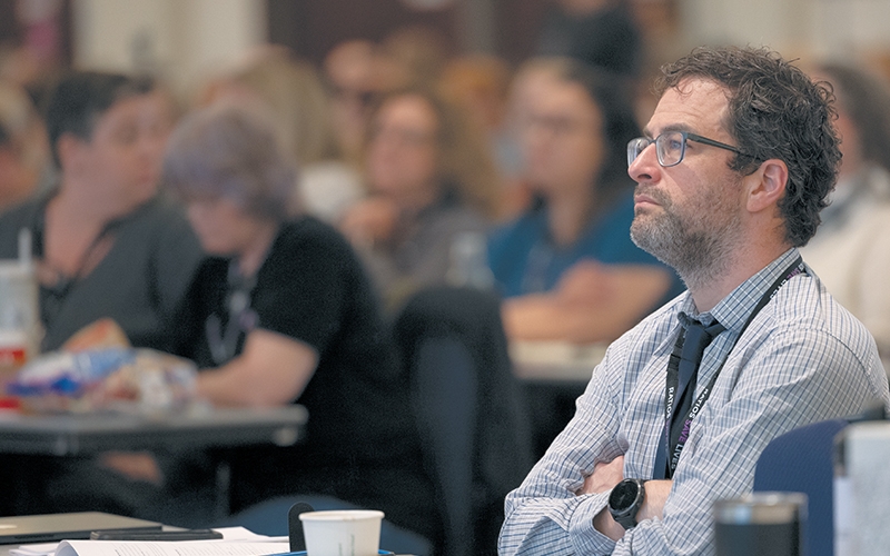 BCNU South Islands region member Christopher Linstead listens to the keynote presentation.