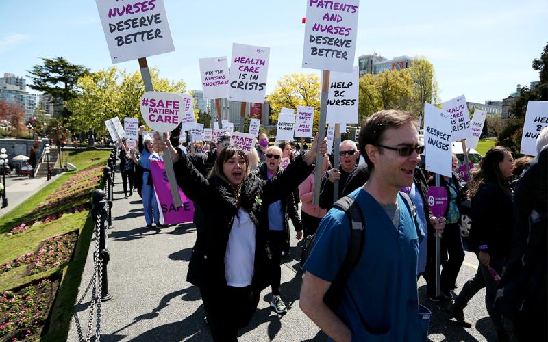 BCNU members take their message to the public in a march along Victoria’s Inner Harbour May 10.