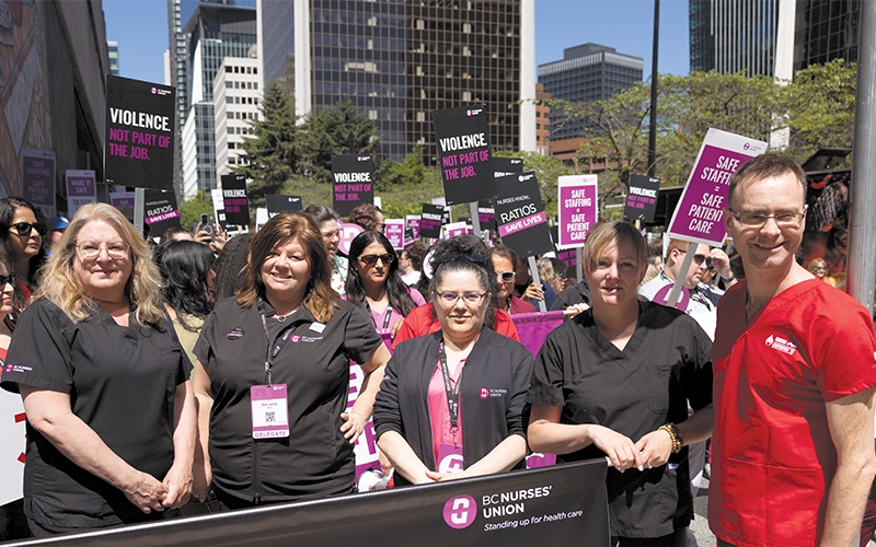 BCNU Provincial Executive Council members lead delegates through the streets of Vancouver.