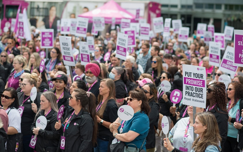 Members rally at Jack Poole Plaza to call on the government to take action to address the nurse staffing crisis.