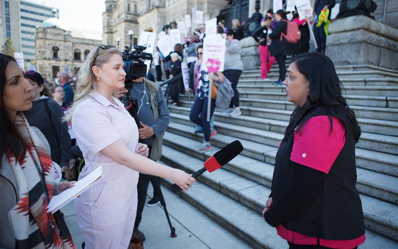 BCNU President Aman Grewal speaks to the media during rally at provincial legislature May 10.