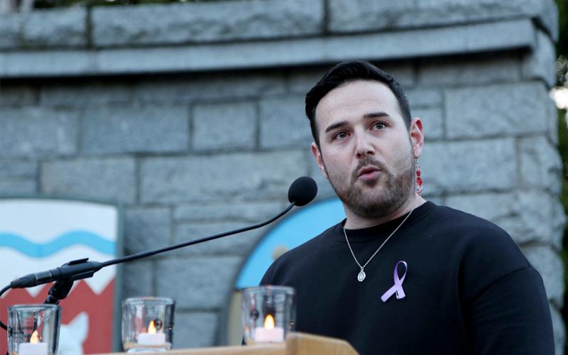 BCNU LGBTQ caucus chair Jesse Dame shares the story of his brother’s recent loss to a poisoned drug supply at May 9 evening vigil.