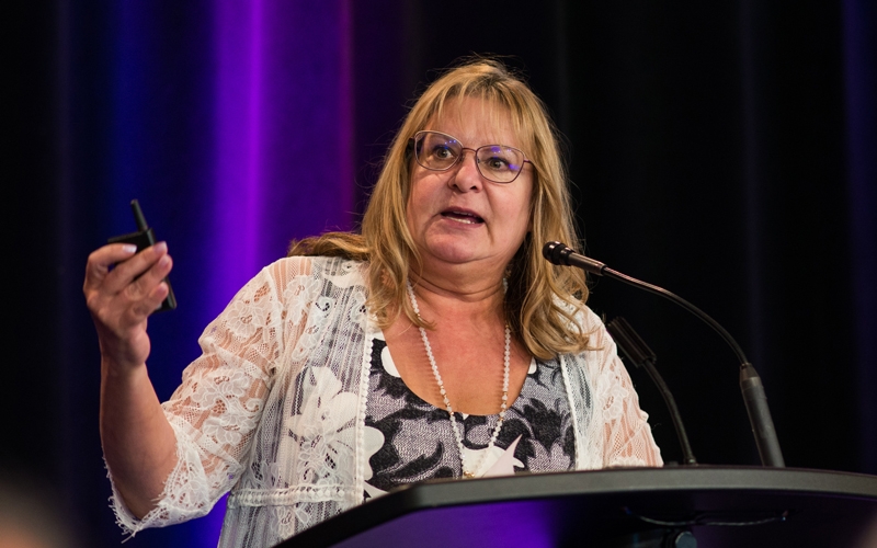 BCNU Treasurer Sharon Sponton reports to delegates.