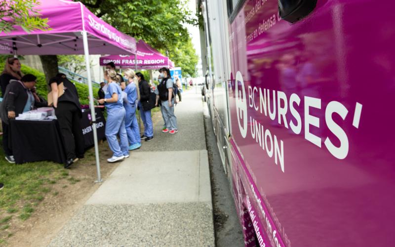 BCNU's Campaign Bus parked along the curb of Keary Street.   