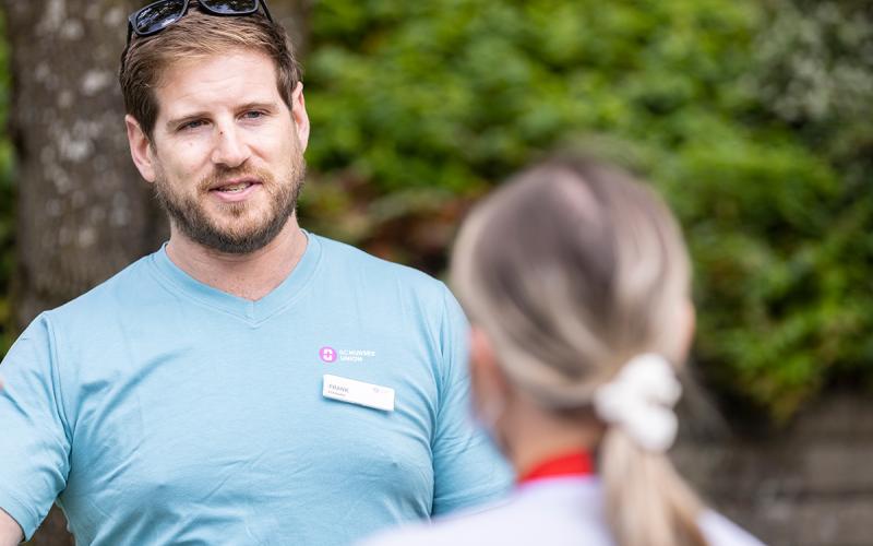 RCH site-steward Frank Martens chats with members during the event.