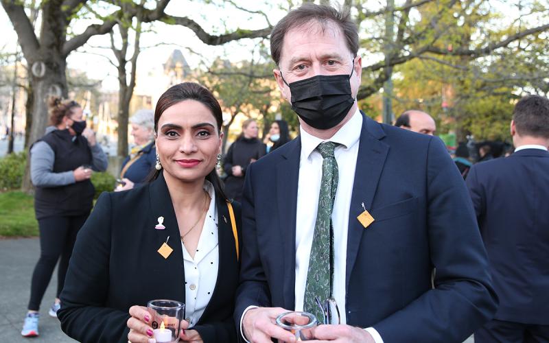 Nurse MLA and BCNU member Harwinder Sandhu is joined by Health Minister Adrian Dix at May 9 evening vigil.