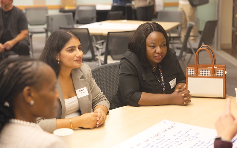 SHARED EXPERIENCES BCNU Richmond Vancouver region member Ibiyemi Abu (right) with Coastal Mountain region member Navneet Chahal.