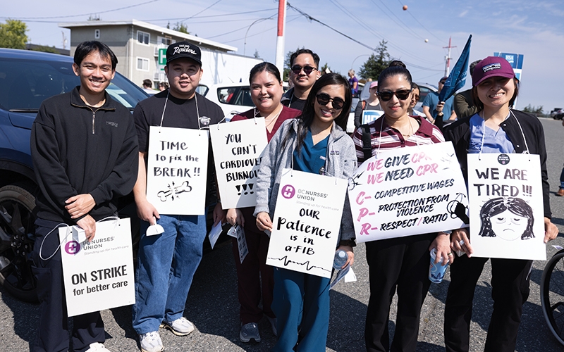 Members participate in a picket line at Nanaimo General Hospital on July 13.